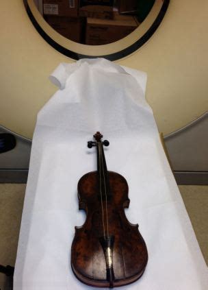 Titanic Real Time, Violin that was played as Titanic sank undergoes...