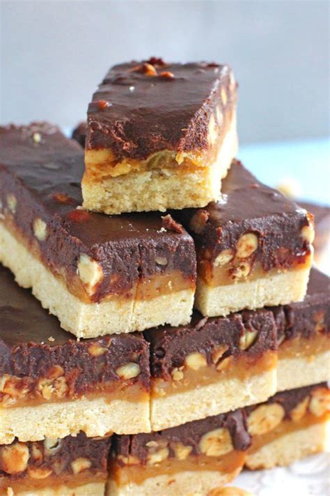 Homemade Snickers Bars are very easy to make and melt in your mouth with deliciousness. Buttery ...