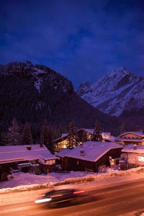 mountain village in alps at night 11808018 Stock Photo at Vecteezy