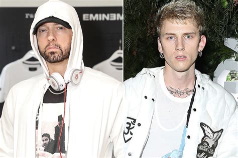 Eminem Calls Machine Gun Kelly a "C*!ksucker" on Stage