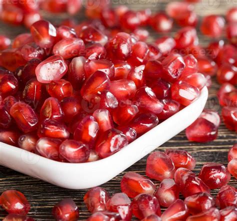 pomegranate seeds, close up 9657009 Stock Photo at Vecteezy