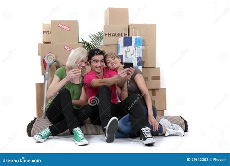 Friends moving in together stock photo. Image of residence - 29642302