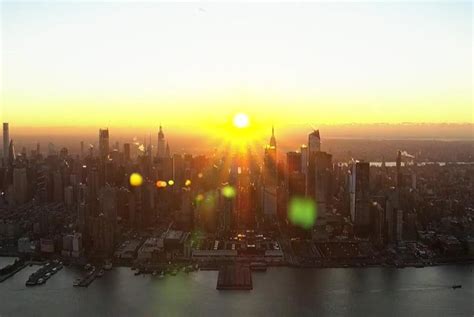 Watch: New Yorkers treated to 'reverse Manhattanhenge' sunrise - UPI.com