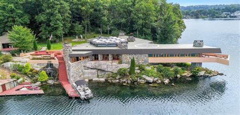 Lake Mahopac island featuring Frank Lloyd Wright-inspired home relisted at $12.9M