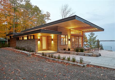 Modern Lakeside Cottage with Douglas Fir Wood Ceilings and Large Roof Overhangs