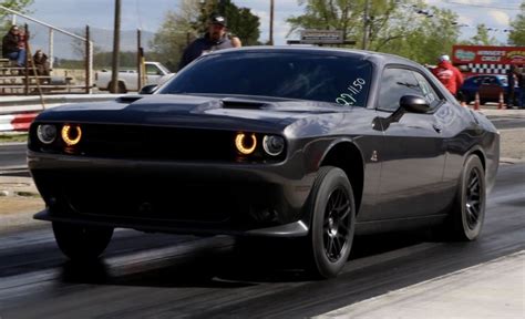 2015 Dodge Challenger Scat Pack 1/4 mile Drag Racing timeslip specs 0-60 - DragTimes.com