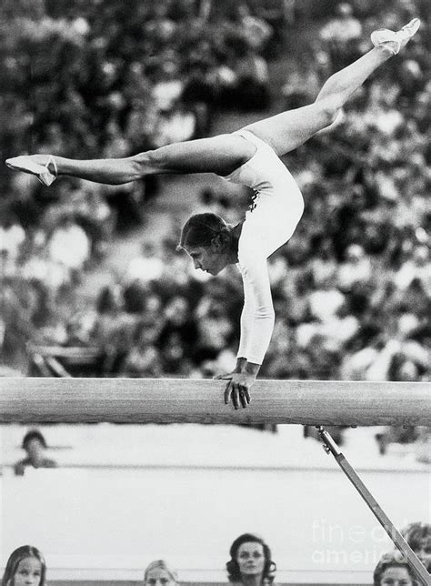 Olga Korbut Performing On Balance Beam Photograph by Bettmann - Pixels