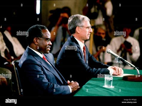 Judge Clarence Thomas is introduced by Senator Danforth to members of ...