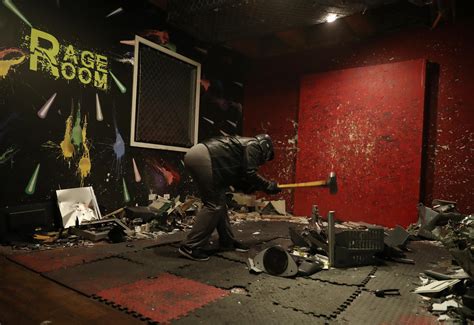 Smash a TV, relieve stress? Patrons pay to break stuff at 'rage rooms' in Chicago, across the ...