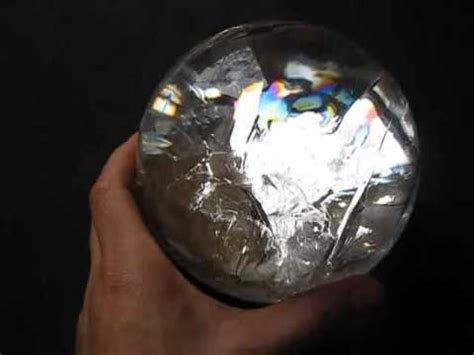 Clear Quartz Crystal Sphere with Psychadelic Rainbow - YouTube