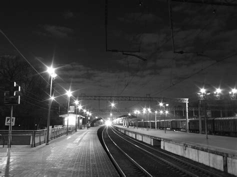 Premium Photo | Railroad track at night