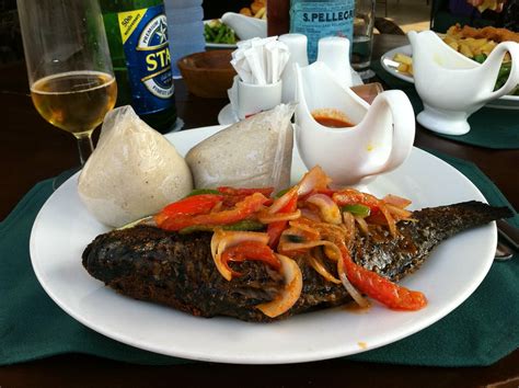 Grilled tilapia with banku | Banku is a kind of a corn meal … | Flickr