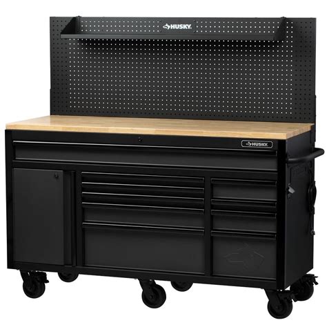Husky Heavy-Duty 61 inch W x 23 inch D 10-Drawer 1-Door Mobile Workbench with Flip-up Pegb ...
