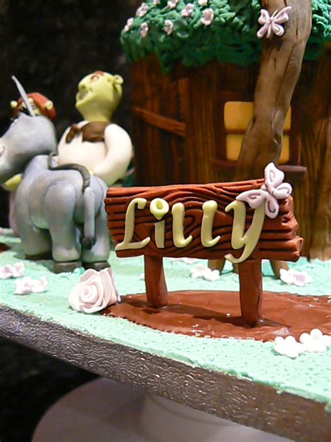 Lily's Shrek swamp cake | Cake, Cake creations, Garden sculpture