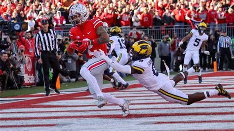 Weird Fan At Ohio State-Michigan Game Has Both Fan Bases Furious