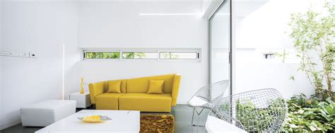 A Wild Modern Home Exterior Contains a Clean Modern Interior