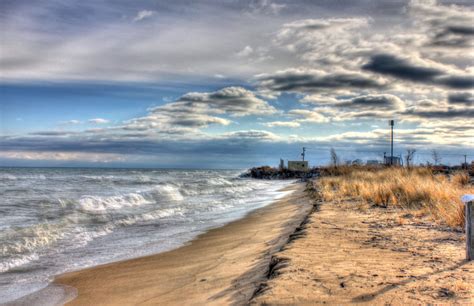 Shoreline and clouds at Illinois Beach State Park, Illinois image ...