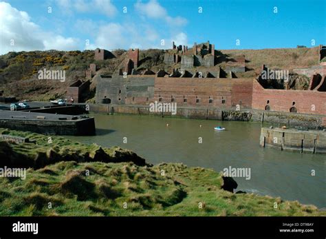 Remains of old industries and harbour, Porthgain, Pembrokeshire, Wales, UK Stock Photo - Alamy