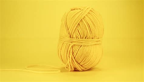 Yellow Yarn on YellowSurface · Free Stock Photo