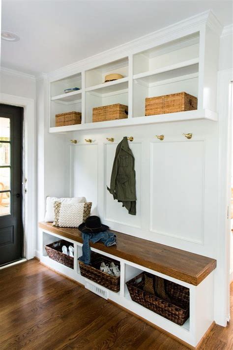 white mudroom bench with basket shoe storage below and shelves above ...