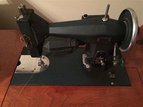 1942 Deluxe Kenmore Rotary Sewing Machine & Cabinet | InstAppraisal