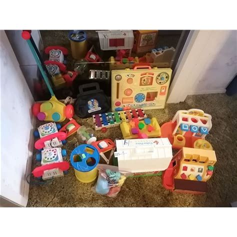 Vintage Fisher-Price Toys - from the 1960's-80s - Beck Auctions Inc.