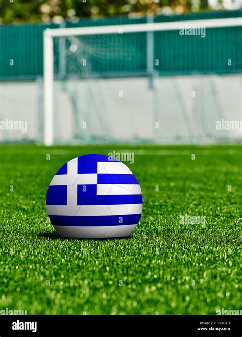 Soccer Ball with Greece Flag on the grass in stadium Stock Photo - Alamy