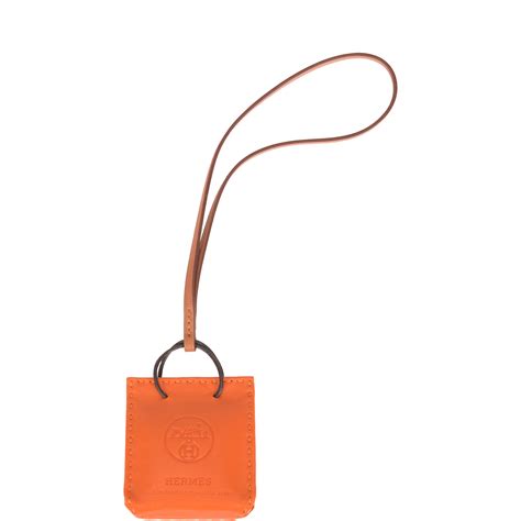 Hermès Orange Bag Charm | Handbags & Accessories Online | Ecommerce Retail | Sotheby's