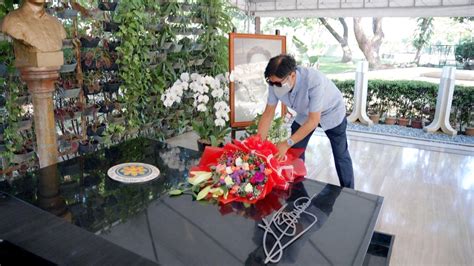 After Philippines election triumph, Marcos visits dictator father's grave | Reuters