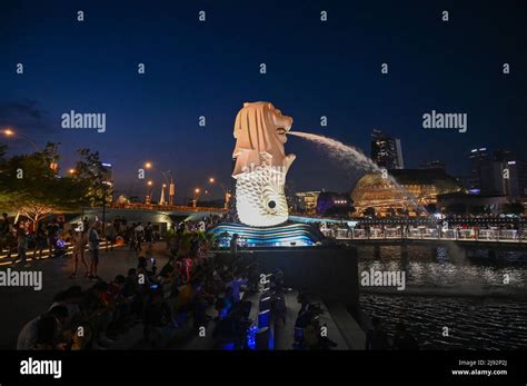 Merlion Park, a iconic statue in Singapore at Night. Merlion is a ...