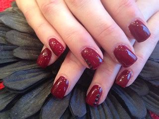 Acrylic nails with ruby red gelux gel polish and black swa… | Flickr