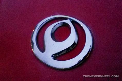 Behind the Badge: The Fascinating History of the Mazda Logo - The News ...