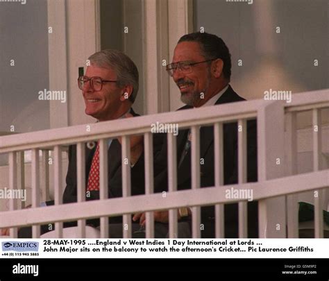 John major sits on balcony watch afternoons cricket hi-res stock photography and images - Alamy