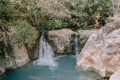 Sustainable off-grid waterfall wedding• Mil Besos