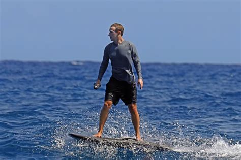 Mark Zuckerberg surfboards in Hawaii with way too much sunscreen