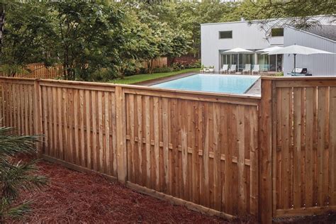 Handcrafted Wood Pool Fence in 2021 | Railings outdoor, Wood fence ...