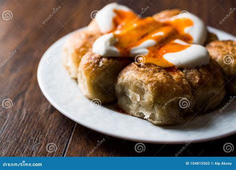 Bosnian Pastry Manti with Yogurt and Fried Butter Sauce / Bosnak Borek Stock Image - Image of ...