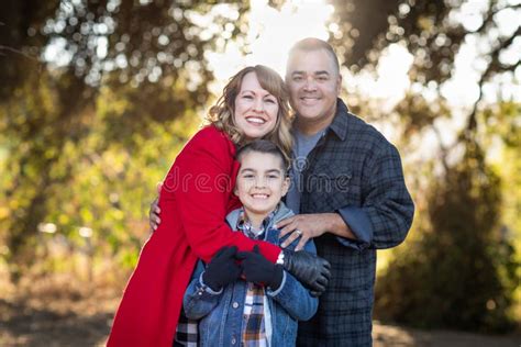 Embracing Mixed Race Family Portrait Outdoors Stock Image - Image of casual, childhood: 166024535