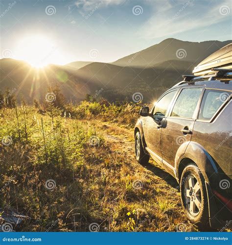 Car for Traveling with a Mountain Road Stock Photo - Image of family ...