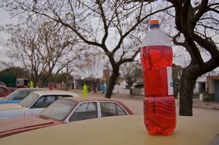 Colored water bottles on cars - why? | turns out it is to ad… | Flickr