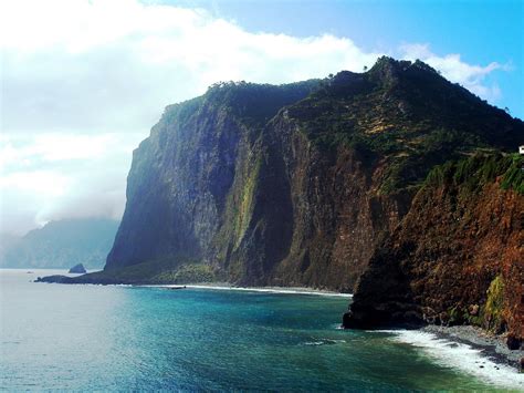 Madeira Portugal Mist Over The Mountains | Portugal tourism, Madeira island, Places to travel