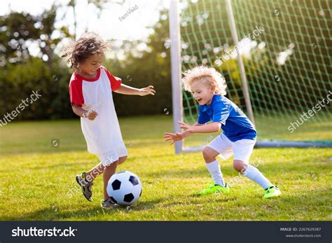 Cute Kids Playing Soccer