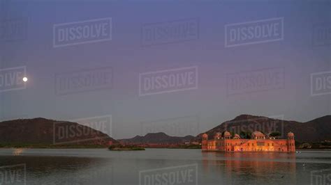 Night view of Jal mahal palace and lake in Jaipur, India - Stock Photo - Dissolve