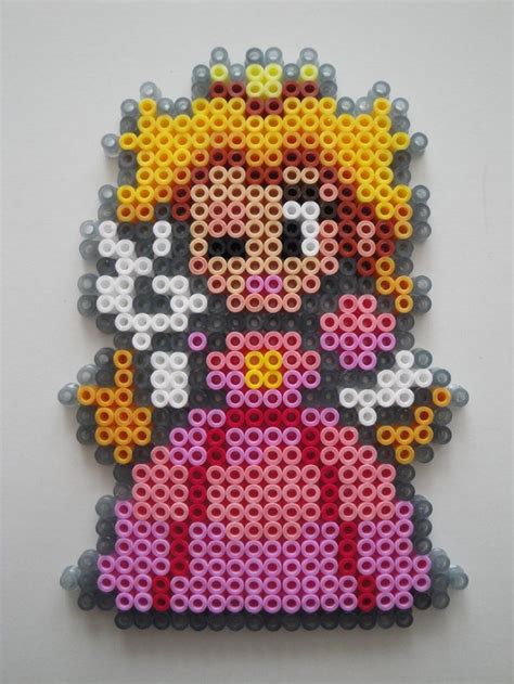 the pixel art is made out of plastic beads