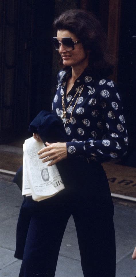 Jacqueline Kennedy Onassis with newspaper to read. London, Fourth of ...