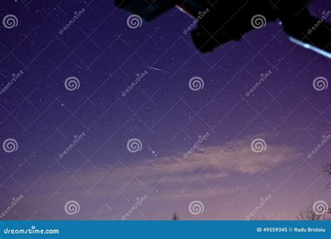 Falling star and Orion stock image. Image of scene, airplane - 49559345