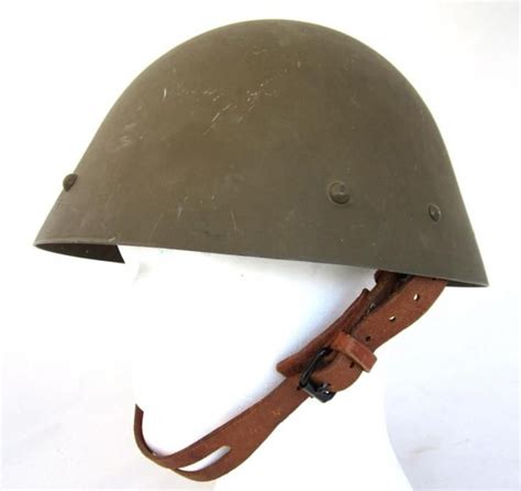 Czech M/34 helmet. 1930´s green-brown paint. Shell inside marked Sch-M (C.A. Scholtz, Matejovce ...