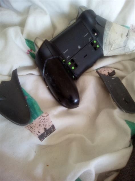 The rubber grips on my elite series 2 controller have fallen off, the other side I patched up ...