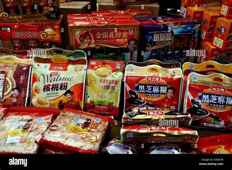 JIU CHI TOWN (SICHUAN), CHINA: A wide variety of pre-packaged food products on display at a food ...