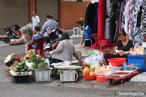 Tan-Binh-Market-fruit-stall - Scooter Saigon Tours